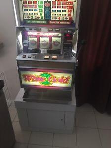 White Gold Ballys Token Slot Machine With Cabinet Stand